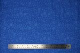 Flat swatch blue (medium blue) Swirly Cotton Flanelette fabric (subtle swirly pattern allover)