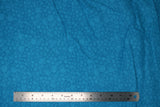 Flat swatch aqua (medium teal blue) Swirly Cotton Flanelette fabric (subtle swirly pattern allover)