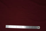 Flat swatch Tricot Lycra solid fabric in bordeaux (burgundy purple)