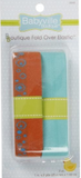 Small package of precut 1" fold over diaper elastics (aqua, orange with aqua circle design along edge)