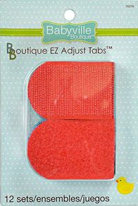 Fanned packages of different colour options of Babyville Boutique EZ Adjust Taps (rounded velcro or hook and loop tabs slightly longer than they are wide, with one rounded end and one square end)