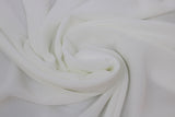 Swirled swatch ivory chiffon fabric