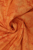Swirled swatch marble printed flannel in orange