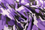 Swirled swatch camouflage printed fabric in purple