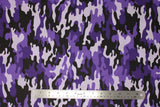 Flat swatch camouflage printed fabric in purple