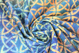 Swirled swatch interlocked knots fabric (dark teal marbled fabric with repeated circular gold interlocked celtic style knot pattern allover)