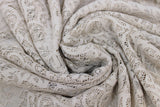 Swirled swatch champagne lace detail fabric