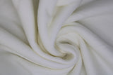 Swirled swatch off white polar fleece