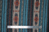 Flat swatch Blue/Orange fabric (vertical striped southwest style print fabric with beige, blue, grey stripes and like coloured designs)