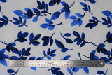 Flat swatch off white/royal leaves fabric (off white fabric with medium large blue leafy stems allover)