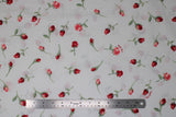 Flat swatch playtime print in roses (white fabric with single red roses and green stems tossed)