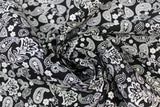 Swirled swatch playtime print in black bandana (black fabric with white bandana/paisley print)