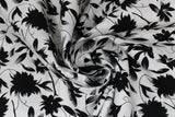 Swirled swatch digital printed fabric in black flowers (white fabric with black tossed floral and flowy stems allover)