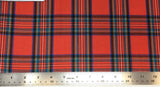 Flat swatch Stewart tartan printed fabric in red (red fabric with black, white, blue plaid lines)