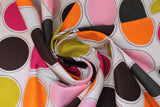 Swirled swatch Big Dot fabric (white fabric with large dots in neat lines with subtle slanted line black borders around, dots in: light pink, dark pink, grey, black, lime green, orange)