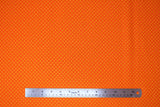 Flat swatch Tonal Dot Orange fabric (deep orange fabric with light orange dots allover)