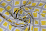 Swirled swatch Diamond fabric (white fabric with criss crossed diamond lines in grey with yellow diamonds within)