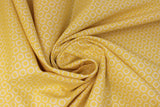 Swirled swatch Cheer fabric (pale yellow orange fabric with subtle white O's circles allover)