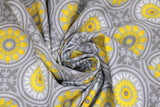 Swirled swatch Mosaic Grey fabric (grey fabric with busy mosaic look design allover in yellow, white and grey shades, circular mandala like badges with decorative fleur des li look squares)