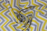 Swirled swatch Chevron White fabric (white fabric with sideways grey and yellow chevron stripes each separated by white chevron stripes)