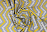 Swirled swatch Chevron Grey fabric (grey fabric with sideways white and yellow chevron stripes each separated by grey chevron stripes)