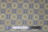 Flat swatch Mosaic White fabric (white fabric with busy mosaic look design allover in yellow and grey shades, circular mandala like badges with decorative fleur des li look squares)