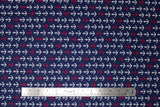 Flat swatch Anchor fabric (navy fabric with many white and few red anchors allover in neat lines)