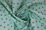 Swirled swatch Mint Dot fabric (mint coloured fabric with grey dots allover)