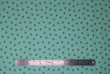 Flat swatch Mint Dot fabric (mint coloured fabric with grey dots allover)