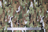 Flat swatch playtime print in camo (pale greens/brown/black/white camo print fabric)
