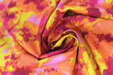 Swirled swatch playtime print in orange (orange/yellow/pink/red colour blotches collage)