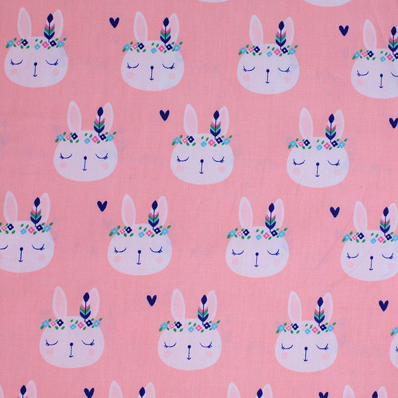 Square swatch flower bunnies fabric (light pink fabric with illustrative look white bunny heads wearing blue themed flower crowns and small tossed blue hearts)