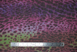 Flat swatch Lili Fleece Print fabric (multicoloured fabric: pink, purple, green with black leopard look animal spots/print)