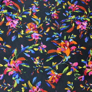 Square swatch Ophelia Satin Print (black fabric with tossed brightly multicoloured floral allover with short stems and leaves)
