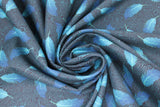 Swirled swatch teal feather fabric (green blue fabric with faint black swirly lines allover and tossed blue/teal ombre style feathers allover)