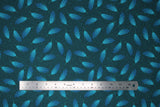 Flat swatch teal feather fabric (green blue fabric with faint black swirly lines allover and tossed blue/teal ombre style feathers allover)
