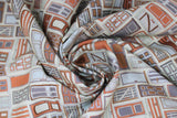 Swirled swatch doors printed fabric (white fabric with horizontal and vertical drawn-style doors allover in various styles/colours following a white, grey, burnt orange, burgundy colourway)