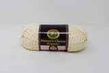 Ball of boucle yarn in almond (off white/pale yellow, tan)