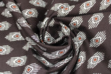 Swirled swatch diamond fabric (black fabric with white, black and red diamond geometric design repeated in alternating space lines)