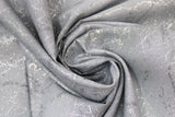 Swirled swatch grey fabric (medium grey marbled look fabric with silver metallic tree branch/scratch look pattern allover)