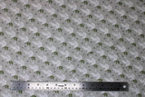 Flat swatch Doves fabric (grey fabric with repeated white doves with green leaves in beak allover with tossed grey stars)