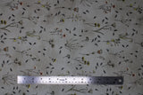 Flat swatch Vintage Grey Floral fabric (grey fabric with loosely tossed floral and stems with leaves and greenery in yellow, pink, blue shades)
