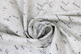 Swirled swatch Parchment Words fabric (white fabric with grey and black cursive style text and words allover "love" "you" etc.)