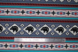 Flat swatch Gray fabric (horizontal striped southwest style fabric with geometric shapes and bear silhouettes/paws allover in grey, black, red and teal shades)