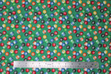 Flat swatch man cave themed fabric in pool balls green (medium green fabric with tossed pool balls)