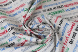 Swirled swatch man cave themed fabric in white text (white fabric with black/grey/red/blue/green writing man cave phrases ex: "NO WORKING" "All day Gaming" etc.)