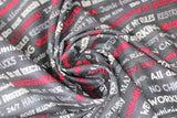 Swirled swatch man cave themed fabric in grey text (dark grey fabric with white/light grey/red writing man cave phrases ex: "NO WORKING" "All day Gaming" etc.)