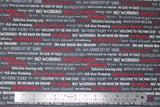 Flat swatch man cave themed fabric in grey text (dark grey fabric with white/light grey/red writing man cave phrases ex: "NO WORKING" "All day Gaming" etc.)