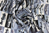 Swirled swatch Cruiser fabric (white grey and black rectangles allover with black and white muscle cars within)