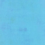 Grunge distressed-look fabric swatch in bright baby blue shade